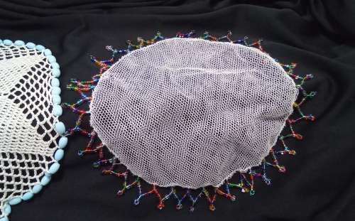 Two Vintage doilies with glass beads