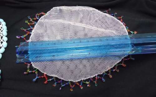 Two Vintage doilies with glass beads