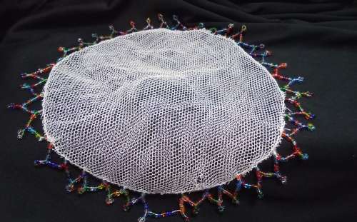 Two Vintage doilies with glass beads
