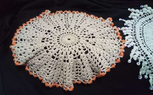 Two beautiful vintage doilies with glass beads