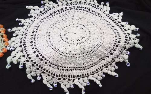 Two beautiful vintage doilies with glass beads
