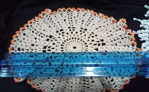 Two beautiful vintage doilies with glass beads