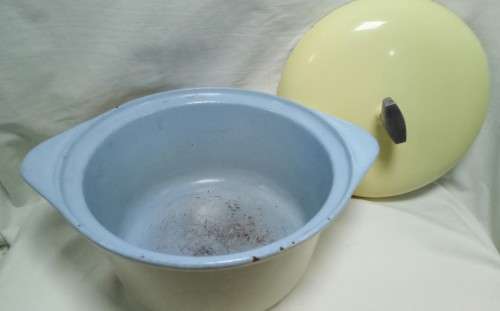 Vintage Yellow round cast iron casserole dish with lid