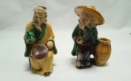 Two lovely small vintage mudmen
