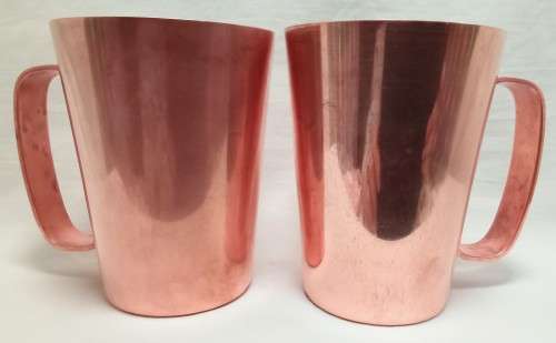 Two beautiful vintage Rhodesian copper mugs by Richard Mead