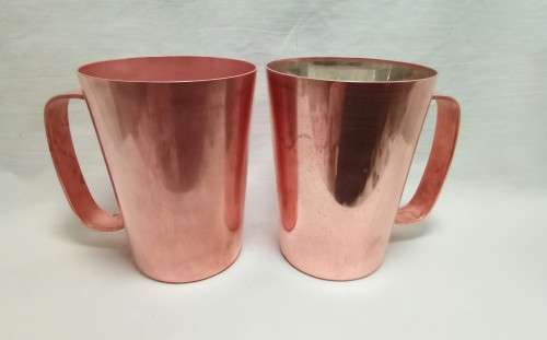 Two beautiful vintage Rhodesian copper mugs by Richard Mead