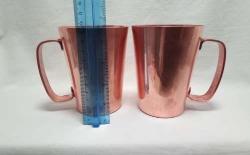 Two beautiful vintage Rhodesian copper mugs by Richard Mead
