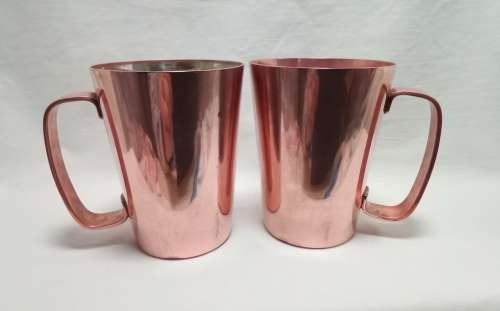 Two beautiful vintage Rhodesian copper mugs by Richard Mead