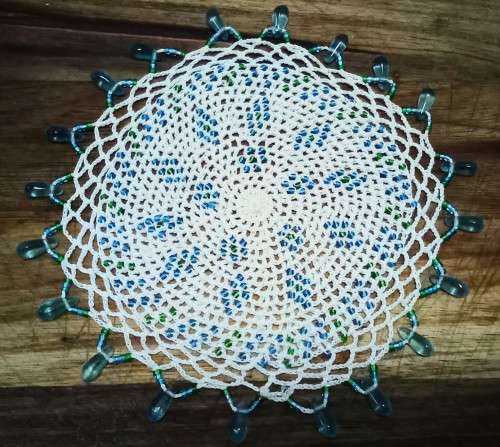 Exquisite vintage doily with turquoise glass beads