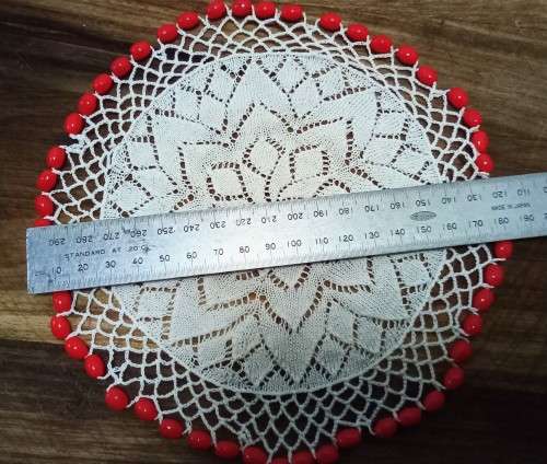 Exquisite vintage doilie with glass beads