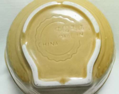 Vintage yellow porcelain mixing bowl