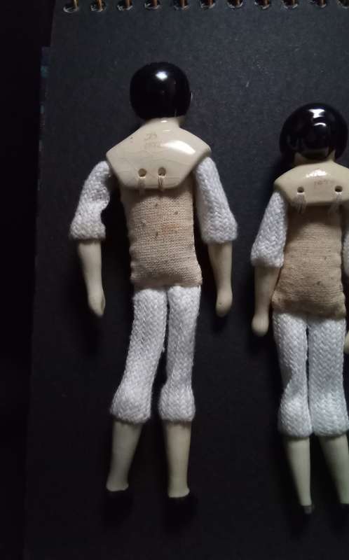 Miniature Bartholomina porcelain doll family of five