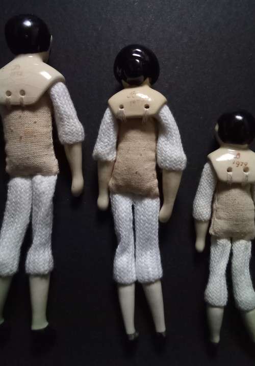 Miniature Bartholomina porcelain doll family of five
