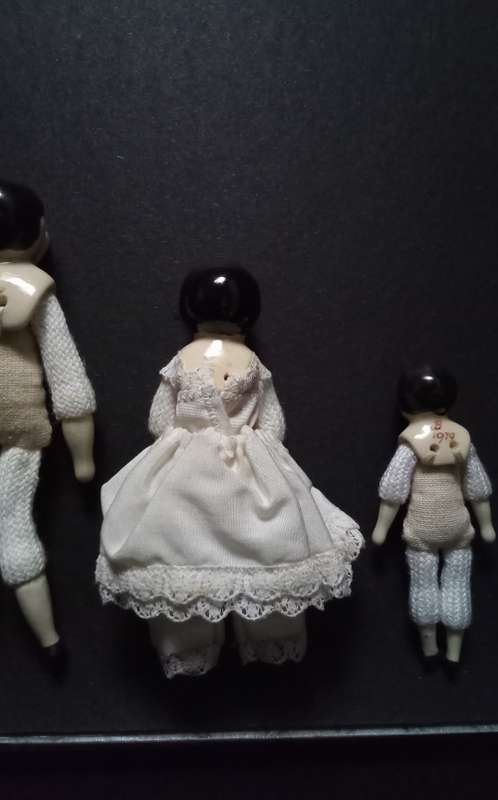 Miniature Bartholomina porcelain doll family of five