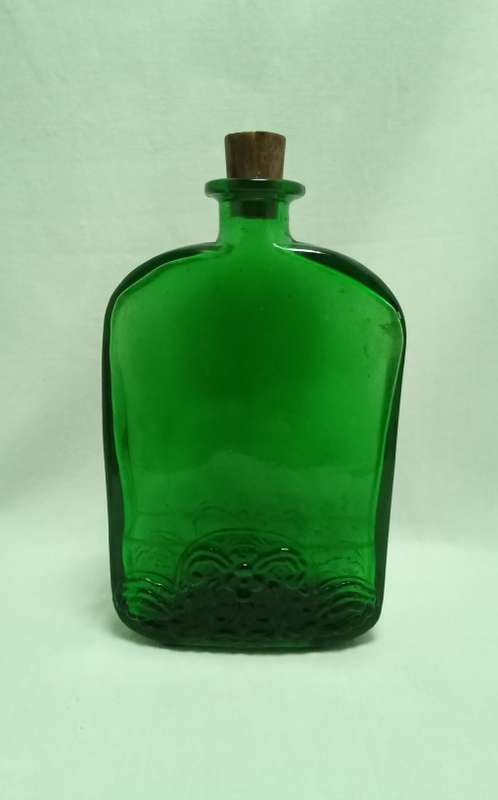 Lovely vintage flat green glass bottle