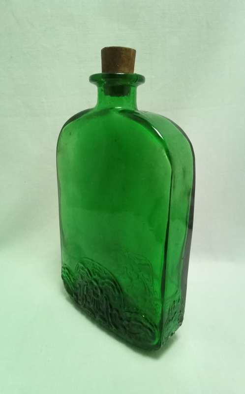 Lovely vintage flat green glass bottle