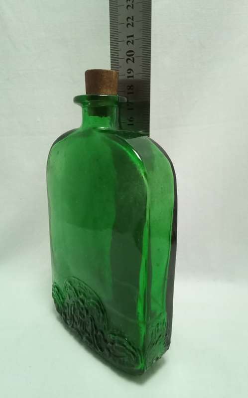 Lovely vintage flat green glass bottle