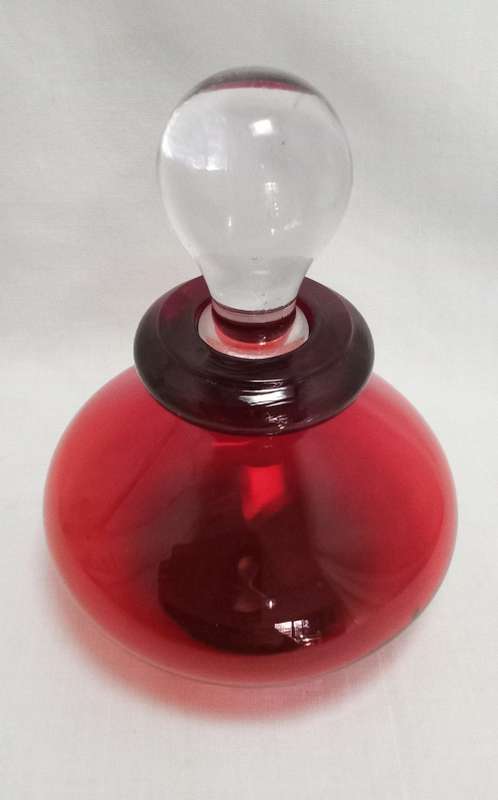 Lovely red glass bottle with stopper