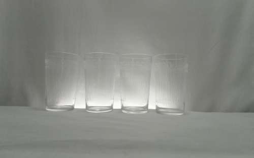 Four Vintage small etched glasses
