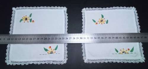 Two lovely small embroidered square doilies