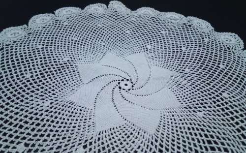 Exquisitely fine crocheted vintage round doily