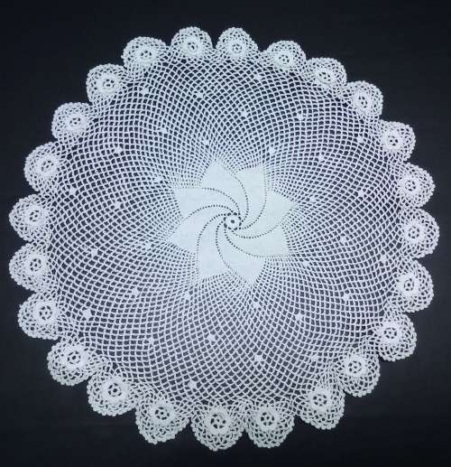 Exquisitely fine crocheted vintage round doily
