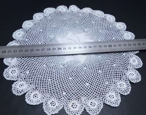 Exquisitely fine crocheted vintage round doily