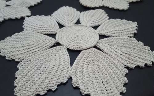 Three crocheted vintage round doily/placemats