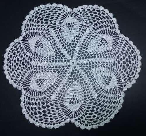Losely crocheted vintage doily - white