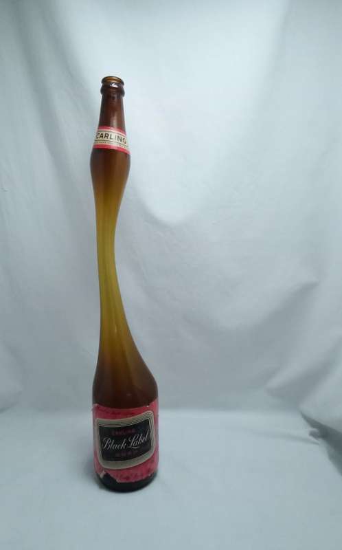 Most unusual vintage Black Label Stretched glass bottle