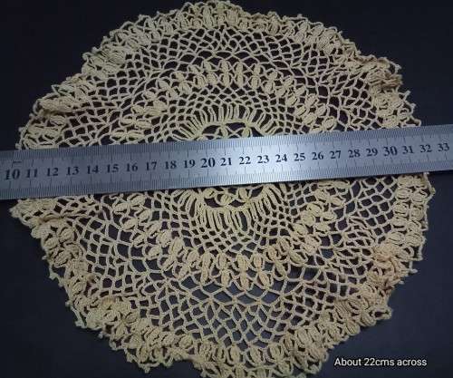 Lovely vintage yellow crocheted doily
