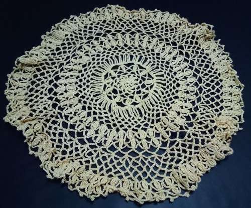 Lovely vintage yellow crocheted doily
