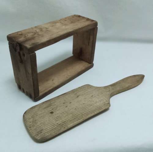 Antique butter mould and paddle