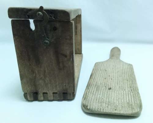 Antique butter mould and paddle