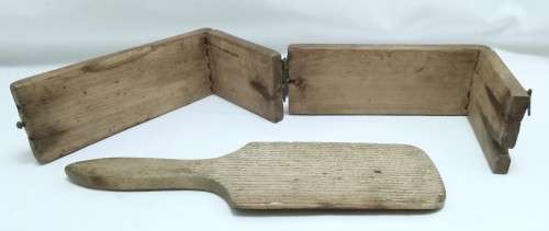 Antique butter mould and paddle