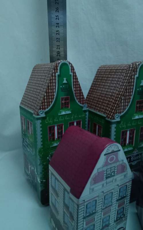 Lovely collection of little house tins in excellent condition