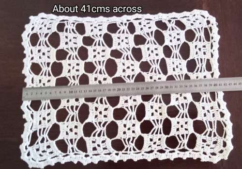 Very pretty crocheted tray cloth - 41cms across