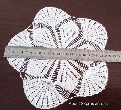 Beautiful unusual vintage crocheted doily  - 23cms across