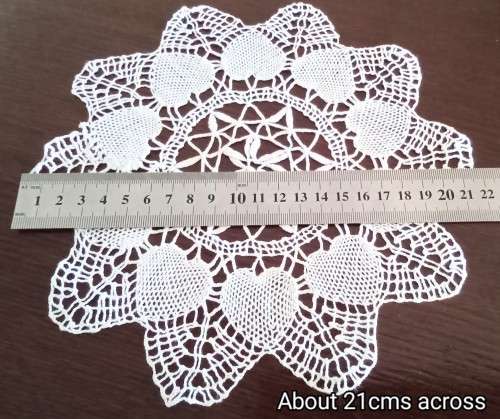 How pretty! Beautiful vintage crocheted doily with   - 21cms across