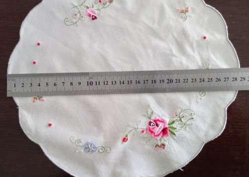 Beautiful embroidered doily - about 30cms across