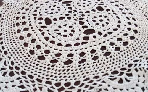 Beautiful crocheted doily - 27cms across