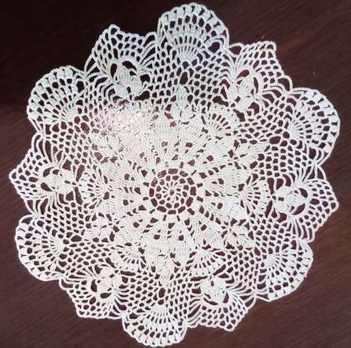 Beautiful crocheted doily - 22cms across