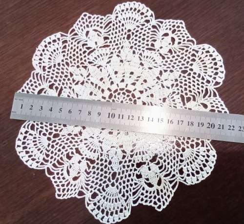 Beautiful crocheted doily - 22cms across