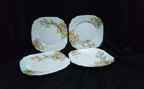 Four charming vintage Royal Albert side plates `Clematis` design