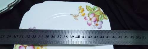 Four charming vintage Royal Albert side plates `Clematis` design