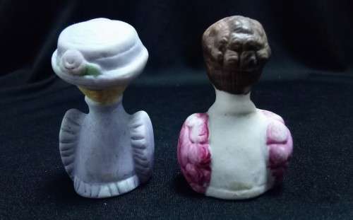 Two Avon thimbles