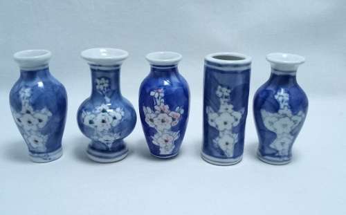 Five cute mini blue and white vases