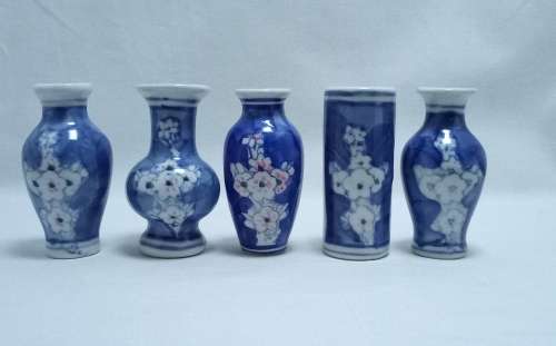 Five cute mini blue and white vases