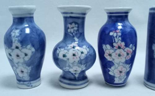 Five cute mini blue and white vases