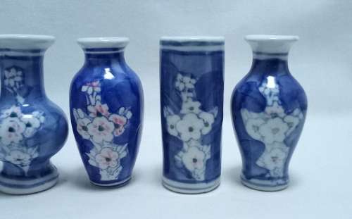 Five cute mini blue and white vases